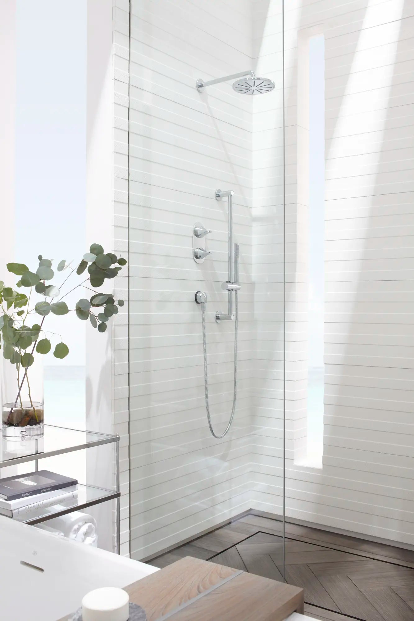 DXV® Modulus Single Function 7.5 in. Round Showerhead // POLISHED CHROME // 39748_Shot1_Shower_LauraMuller_CDNwebp_0e796a06-bdb8-452a-819d-b4157c0deee8.webp