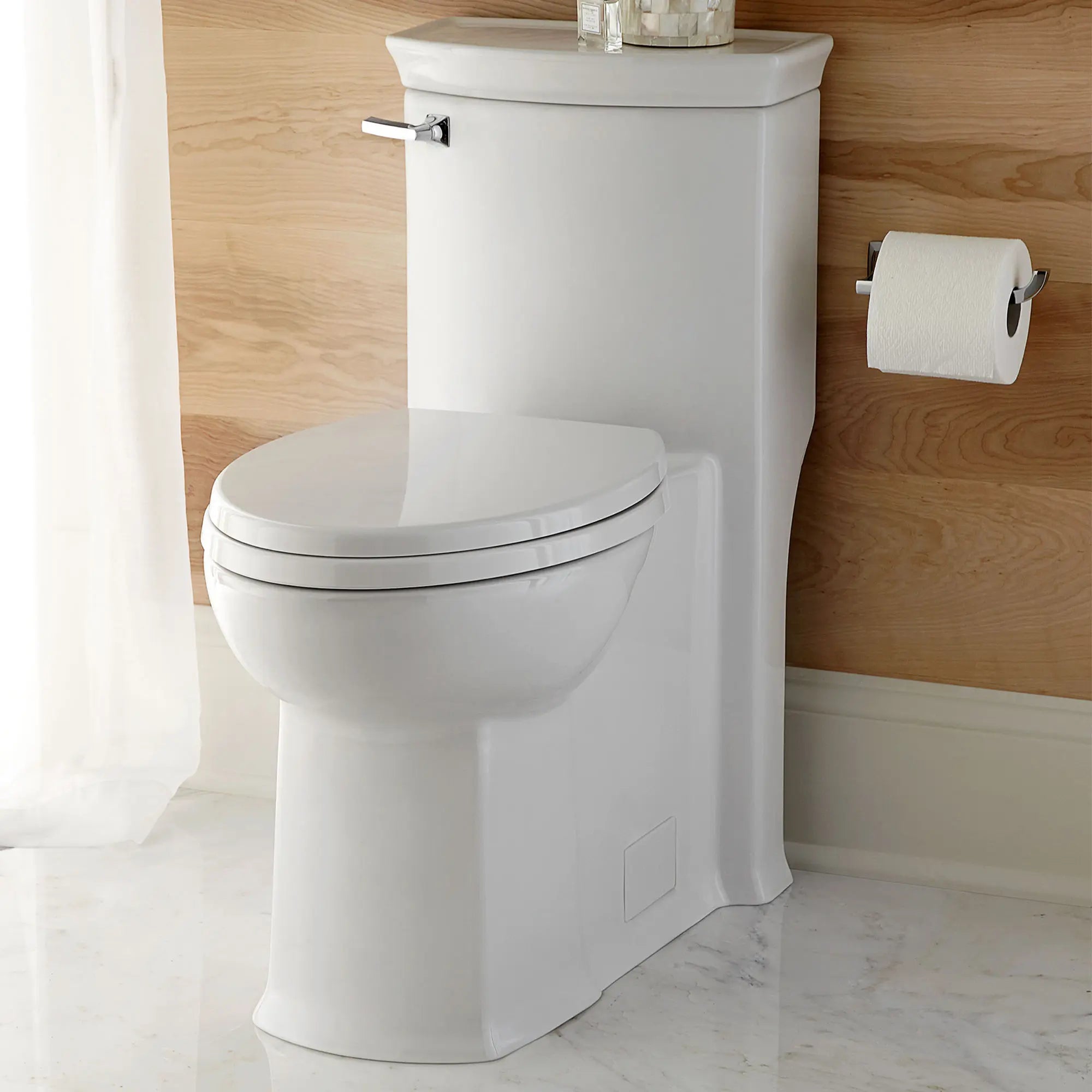 Wyatt® One-Piece Chair Height Left-Hand Trip Lever Elongated Toilet with Seat // CANVAS WHITE // 41028_B_D22005C101415_0_CDNwebp.webp